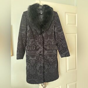 Coat with floral pattern.
